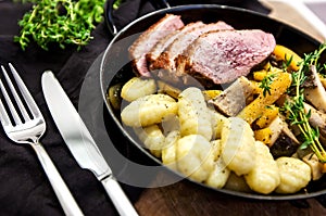 Roasted duck with pear,marinated in red wine with gnocchi and Oysters
