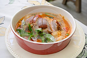 Roasted Duck in Red Curry with tomato,pineapple,Lychee prepared in coconut milk