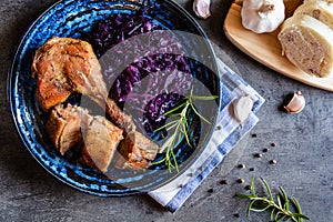 Roasted duck with stewed red cabbage and dumplings