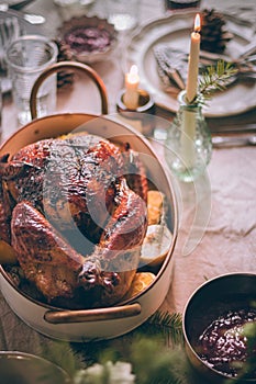 Roasted festive Thanksgiving Day turkey on festive table setting. Family celebration. Thanksgiving day in November. Roasted