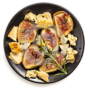 Roasted Figs with Honey and Rosemary and Baked Feta Cheese Top view Isolated