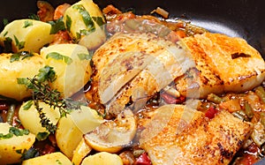 Roasted fish and potatoes