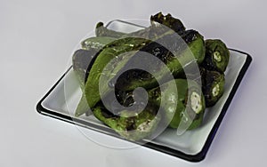 Roasted green chili peppers in a small-plate tapas