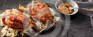 Roasted or grilled Eisbein on sauerkraut