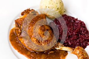 Roasted leg of duck, red cabbage and potato dumpli