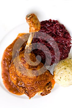 Roasted leg of duck, red cabbage and potato dumpli