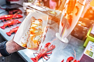 Roasted lobster with cheese at Myeong-dong street food in Seoul, South Korea photo