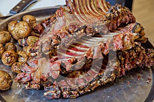 Roasted meat over an open fire, cooked in a special way.Barbecue is prepared of lamb or sheep meat and processed by