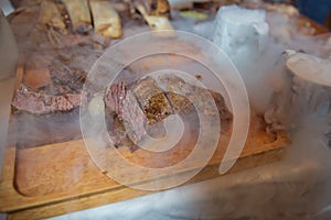 Roasted meat over an open fire, cooked in a special way.Barbecue is prepared of lamb or sheep meat and processed by slasher. Many photo