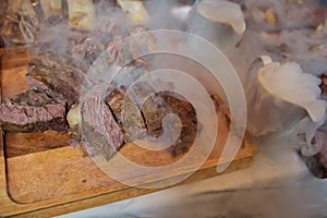 Roasted meat over an open fire, cooked in a special way.Barbecue is prepared of lamb or sheep meat and processed by slasher. Many photo