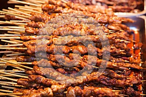 Roasted meat on wood sticks