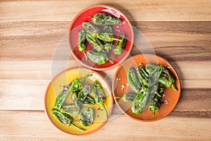 Roasted padron peppers photo