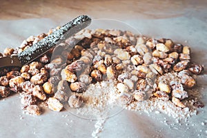 Roasted peanuts in icing sugar. groundnut, goober, monkeynut, earth-nut