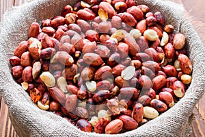 Roasted peanuts in a sack close up