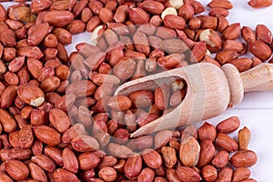 Roasted peanuts with spatula