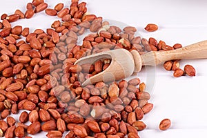 Roasted peanuts with spatula