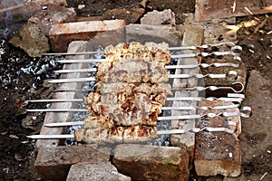 Roasted pork meat on the grill. Caucasian shashlik