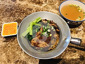 Roasted Pork Rib Noodles in Clay Pot.