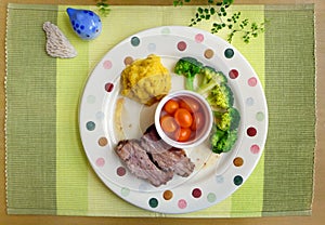 Roasted pork ribs and vegetable meal