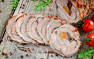 Roasted Pork Roll stuffed with Dried Apricots, Cheese and Walnuts.