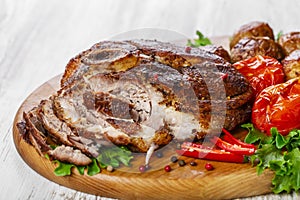 Roasted pork shoulder on the bone