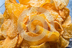 Roasted potato chips in bowl