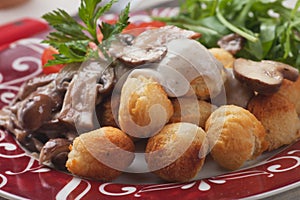 Roasted potato croquettes with portabello mushrooms
