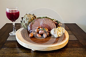 Roasted Prime Rib Steak with buttered artichoke, rosemary roasted small red potatoes