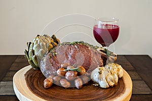 Roasted Prime Rib Steak with buttered artichoke, rosemary roasted small red potatoes