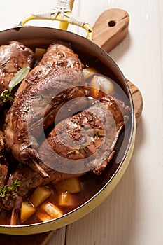 Roasted Rabbit Haunch in Pan with Fresh Herbs