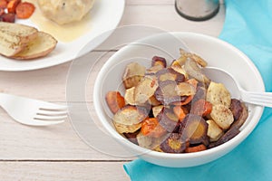 Roasted root vegetables: potatoes, carrots