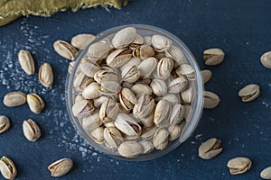 Roasted And Salted Pistachios In Glass Bowl