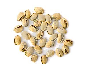 Roasted and salted pistachios in shell on a white background