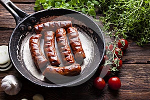 Roasted sausage, fresh vegetables and herbs