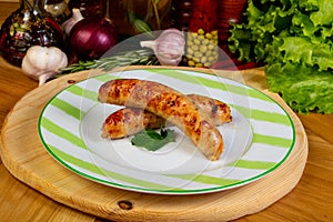 Roasted sausages in the plate