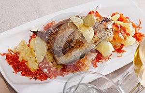 Roasted scomber with potatoes and carrot