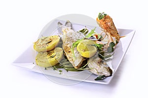 Roasted sea bass with garlic