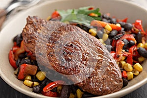 Roasted turkey with black bean salad