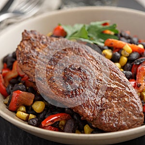 Roasted turkey with black bean salad