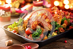 Roasted turkey garnished with potato. Thanksgiving or Christmas dinner