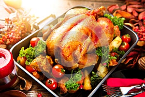 Roasted turkey garnished with potato. Thanksgiving or Christmas dinner