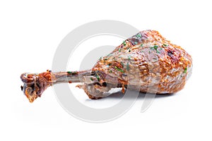 Roasted turkey leg isolated on white