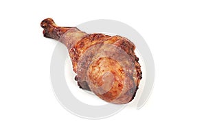 Roasted turkey leg isolated on white background.