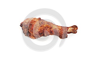 Roasted turkey leg isolated on white background.