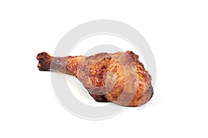 Roasted turkey leg isolated on white background.