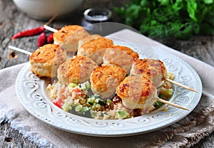 Roasted turkey meat balls with couscous and vegetables