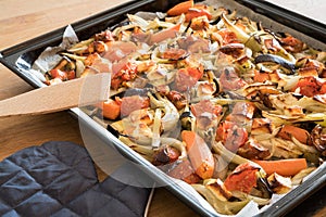 Roasted vegetables and cheese in a baking tray