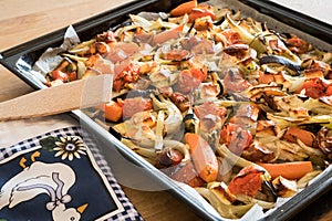 Roasted vegetables and cheese in a baking tray