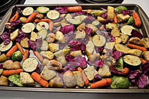 Roasted vegetables red cabbage, carrots, Brussels sprouts, yellow and zucchini squash, mushrooms, white potatoes, with rosemary, o