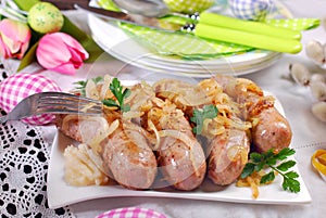 Roasted white sausage with onion for easter